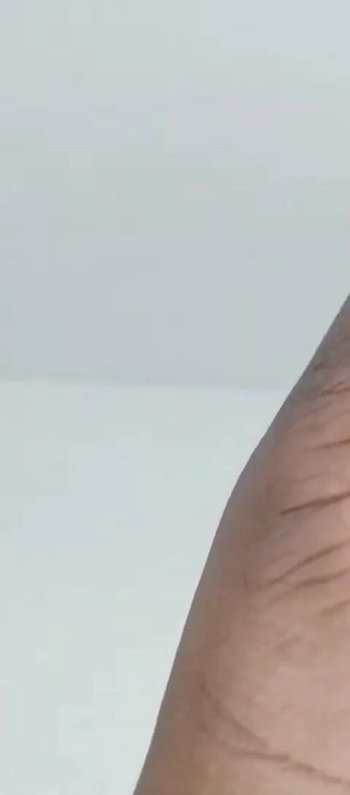 Attach the handles to the mirror using construction adhesive.