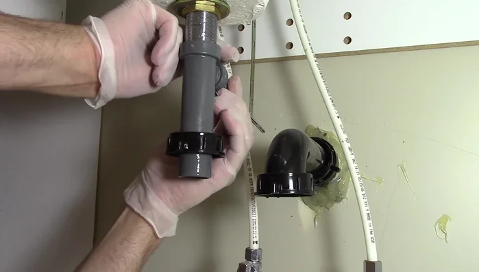 Tighten the pivot rod.