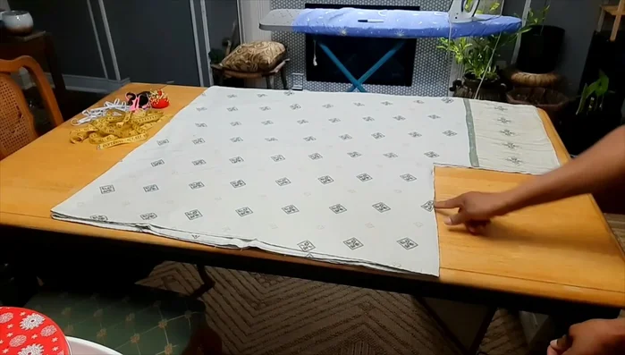 Trim excess fabric: Ensure both sides match in length; trim excess fabric as needed to create a seamless fit.