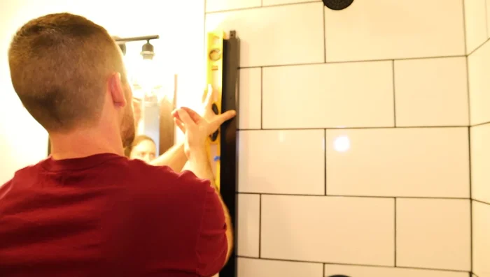 Attach the rails using pan-head screws and sheetrock anchors where necessary.