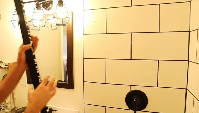 Attach the rails using pan-head screws and sheetrock anchors where necessary.