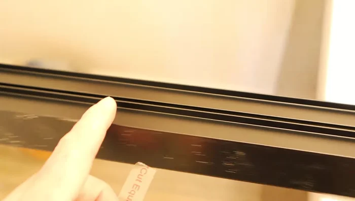 Cut the top rail on one side only, according to the measurements and instructions.