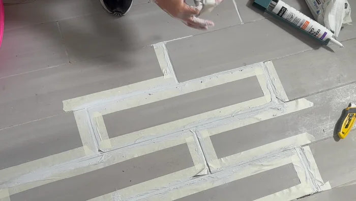 If necessary, touch up any remaining cracks with a small amount of grout and smooth with your finger, then clean immediately.