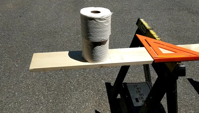 Measure and cut wood boards. Cut two 15-inch long boards for the sides and three 9 1/2 inch boards for the back and front.