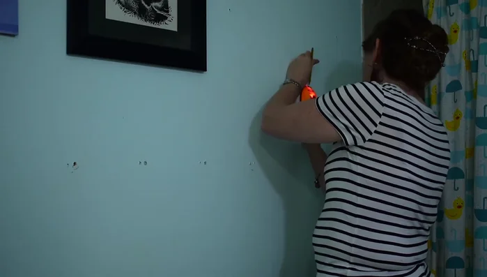 Mark stud locations on the board.