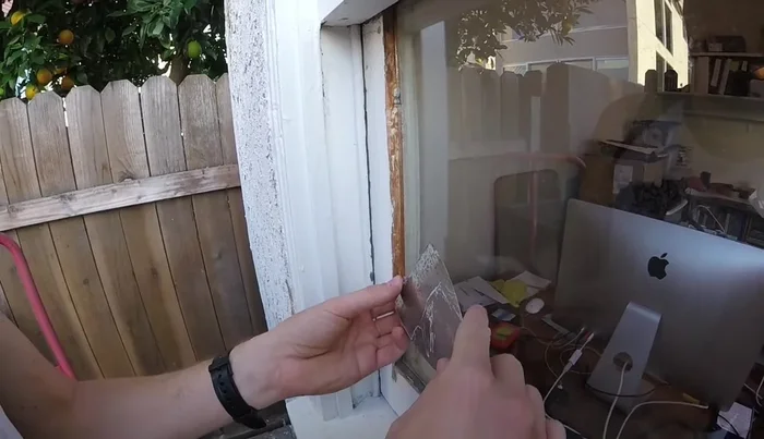 Tool the sealant to create a 45° angle away from the window to shed water.