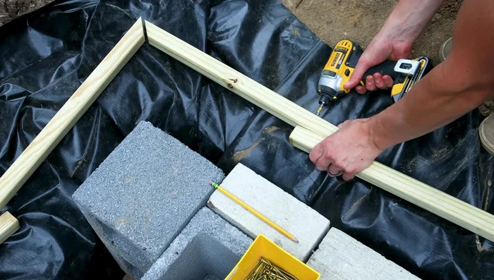 Create a frame: Construct a frame around the Basin using pressure-treated spindles to support the liner and galvanized mesh.