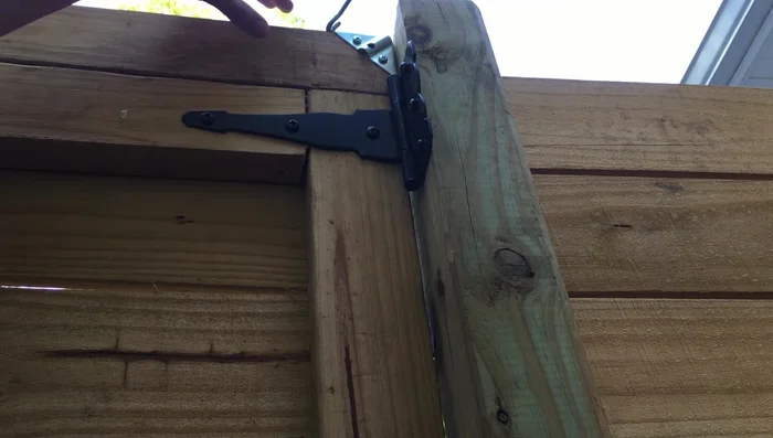 Attach the turnbuckle to the top bracket.