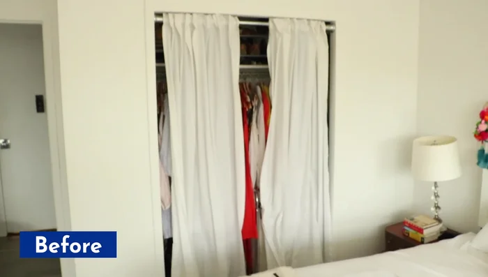 Install custom barn doors to replace the shower curtain closet solution.