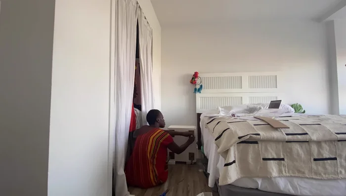 Install custom barn doors to replace the shower curtain closet solution.