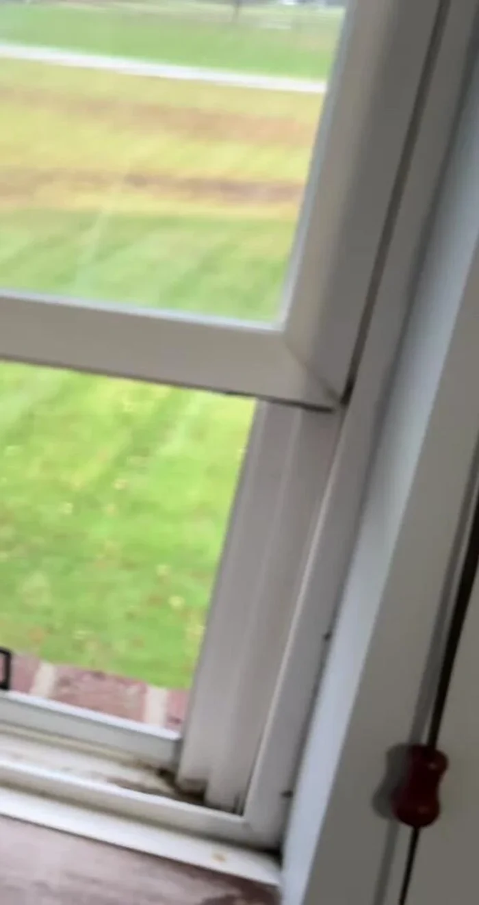 Press firmly to ensure the seal adheres securely to the window.