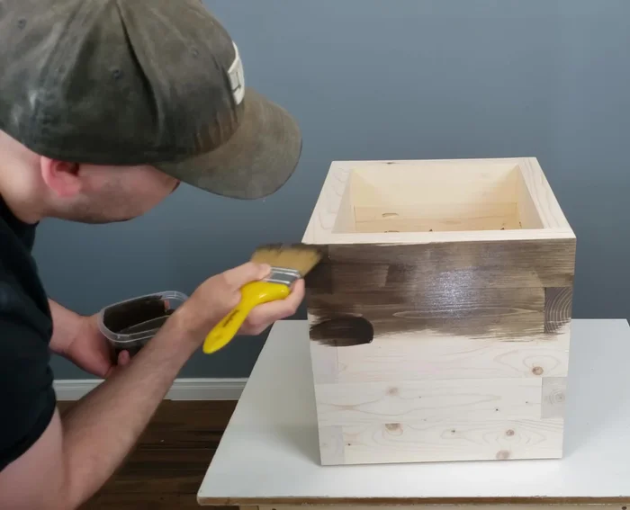 Apply two coats of exterior wood stain.