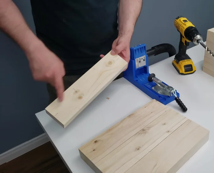 Create pocket holes on the 12-inch pieces (bottom) and longer pieces (sides).