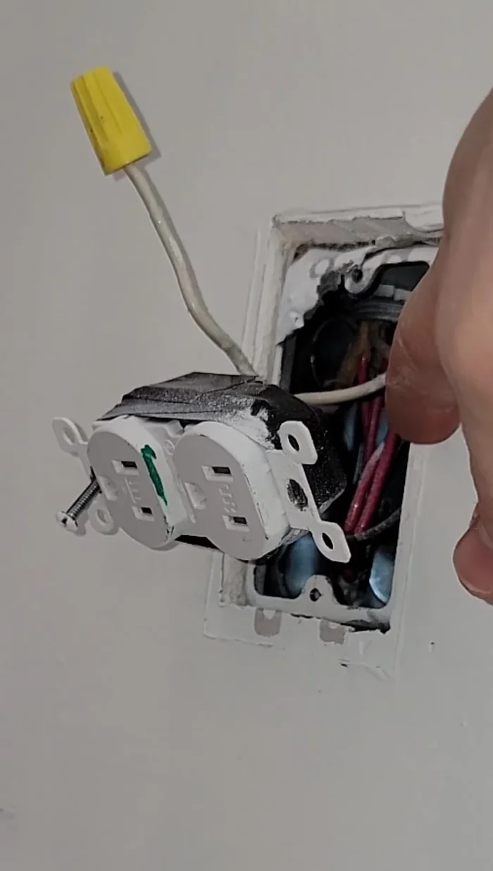 Reconnect the neutral and ground wires. After reconnecting, recheck voltage at the faulty outlet using the multimeter.