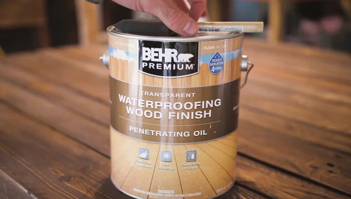 Apply outdoor waterproof deck stain.