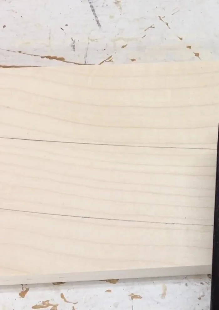 Sand the new leg section to match the existing piece in both appearance and feel.