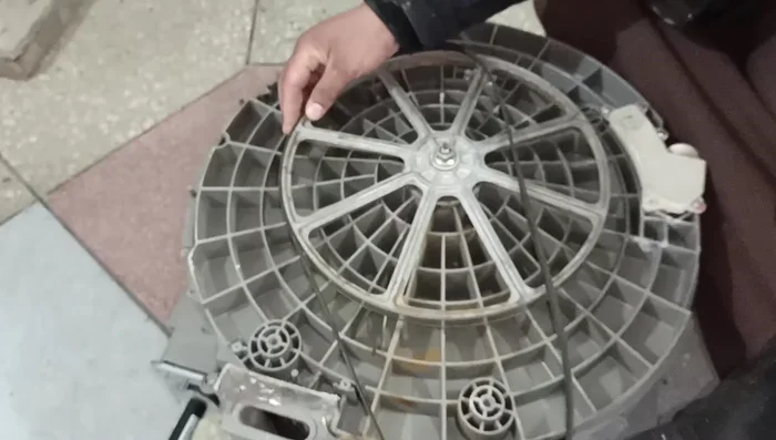 Put the belt on the pulley and motor.