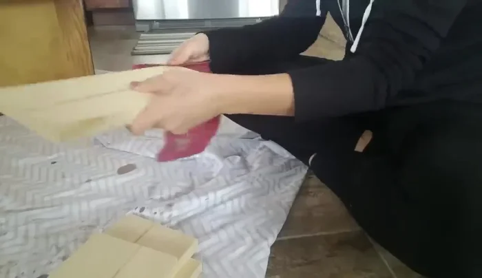 Stain the new wood pieces to match the drawer.