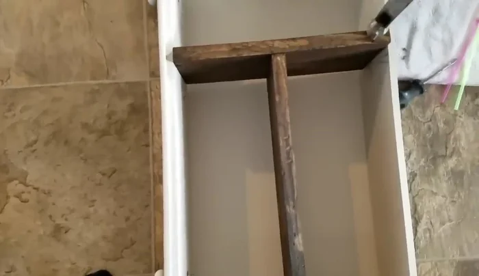 Attach the shelves to the inside of the drawer using nails.