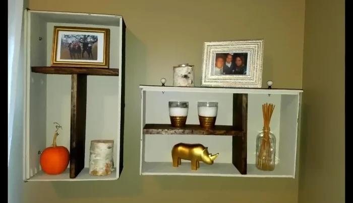 Hang the shelves on the wall, experimenting with vertical or horizontal orientations.