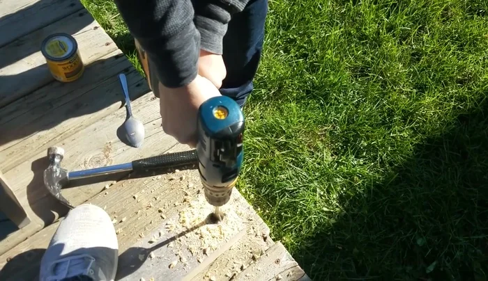 Drill holes in side boards: Drill one-inch holes on both sides of the thicker side boards to thread rope through.