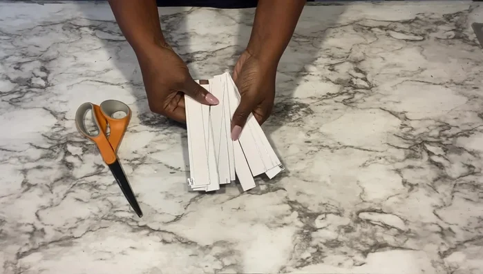 Prepare the base (Method 2): Use felt pads from Dollar Tree, which are less thick than the foam boards originally used in the video, but provide sufficient shadow casting.