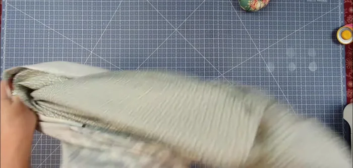 Trim selvages: Trim the excess fabric from both ends, ensuring straight edges.