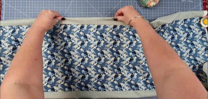 Trim selvages: Trim the excess fabric from both ends, ensuring straight edges.