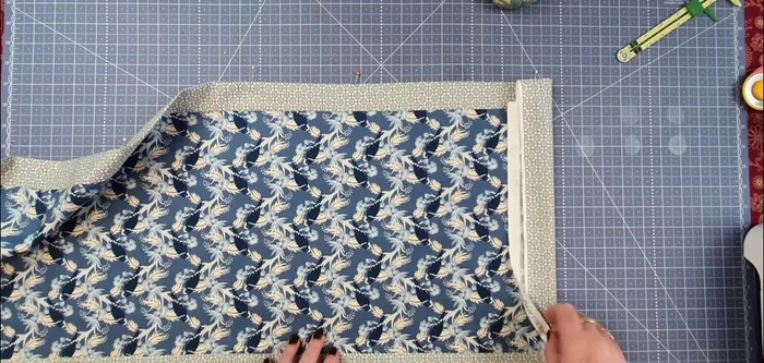 Trim selvages: Trim the excess fabric from both ends, ensuring straight edges.