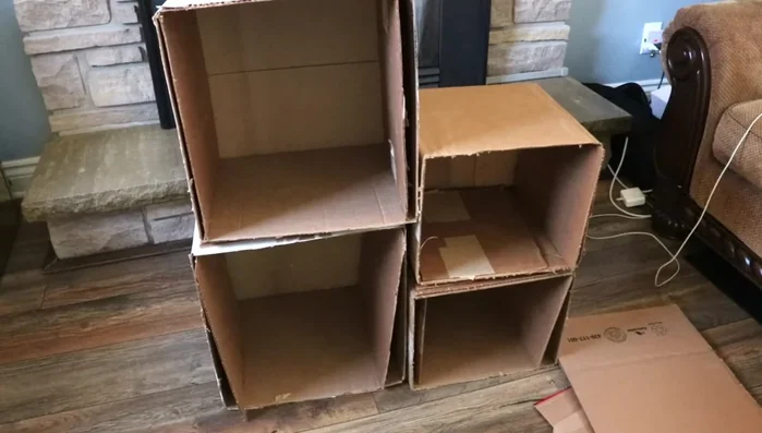 Cut additional cardboard pieces: Cut pieces to reinforce the sides and create supportive structures between the stacked boxes.