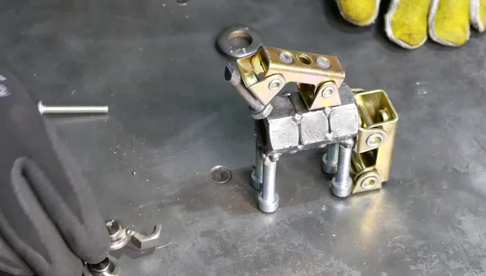 Weld the tail bolt to the body.