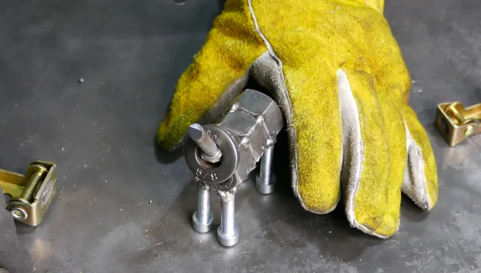 Weld the tail bolt to the body.