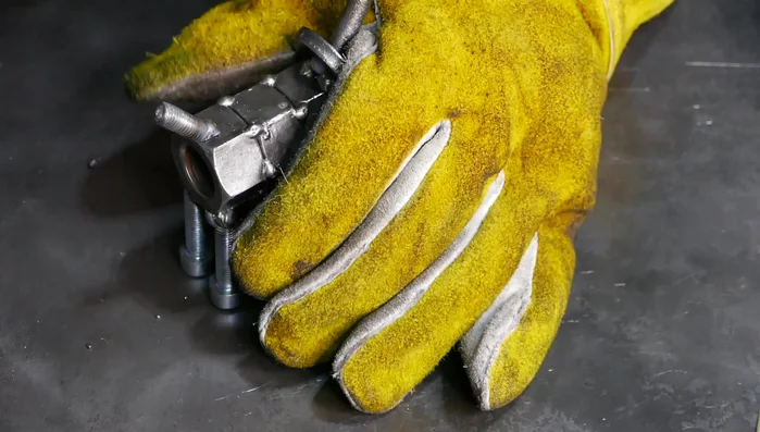 Weld the tail bolt to the body.