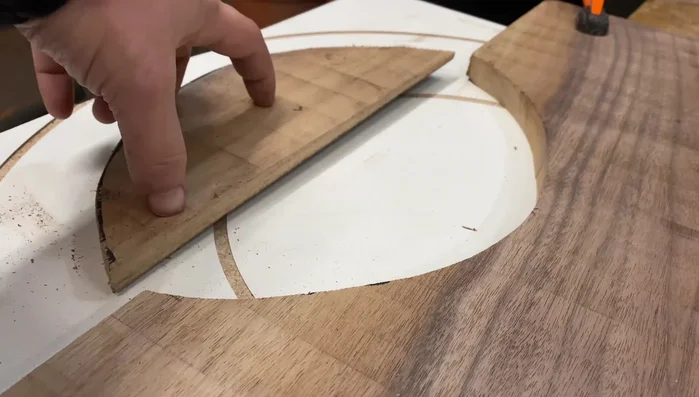 Clean up the edges of the circle with a disk sander.