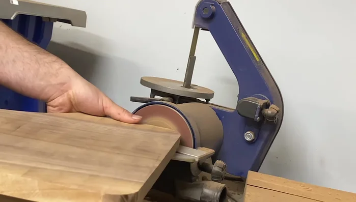 Clean up the edges of the circle with a disk sander.