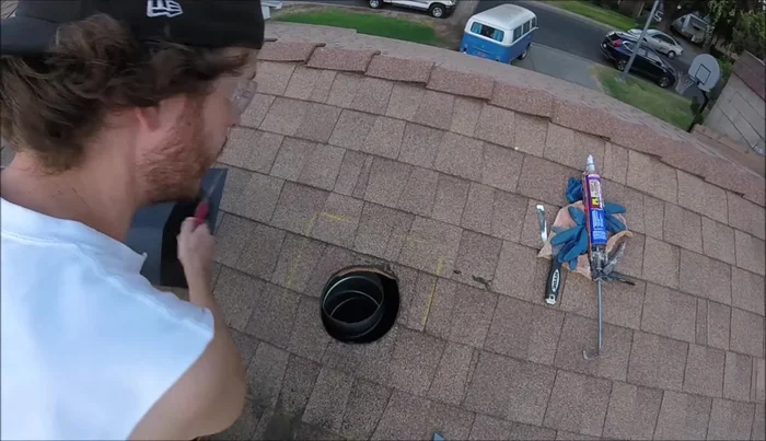 Remove any roofing nails interfering with the vent installation.