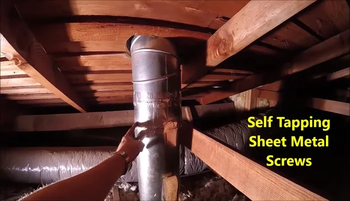 In the attic, connect the ducting pipe to the vent using self-tapping screws and seal all joints with ducting foil tape.