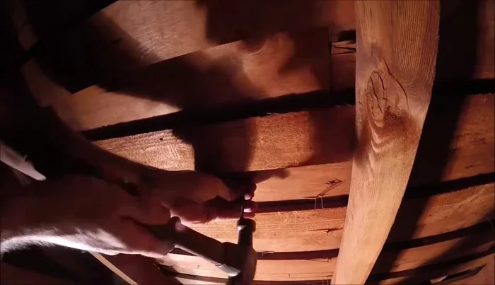 Drive a nail through the marked spot to indicate the center of the hole.