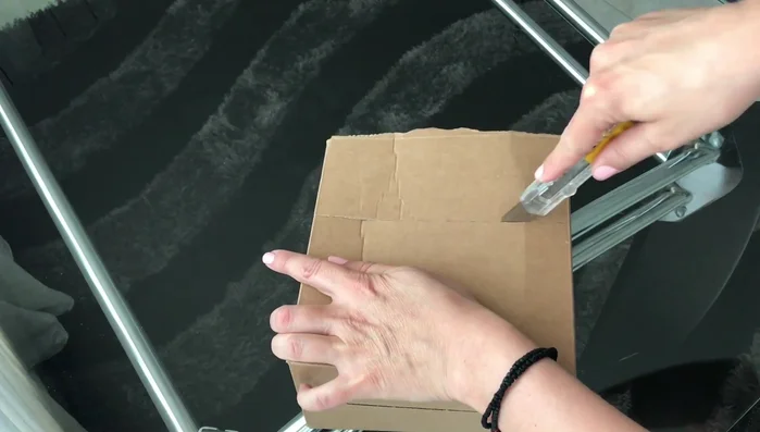 Cut the cardboard box to your desired size.