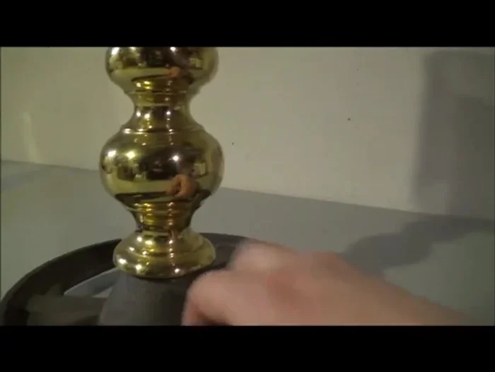 Add the candelabra bulb base: Attach the base of a candelabra-type bulb to the assembled structure.