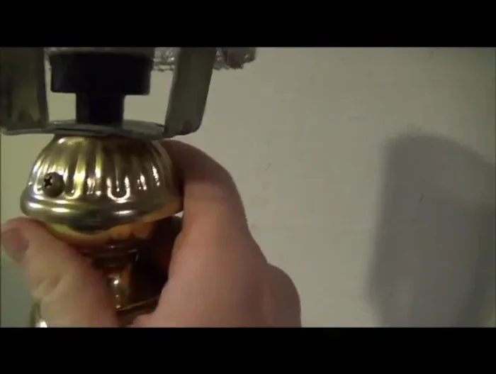 Add the candelabra bulb base: Attach the base of a candelabra-type bulb to the assembled structure.