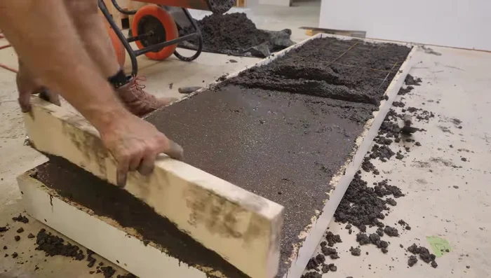 Sand and seal the concrete countertop.