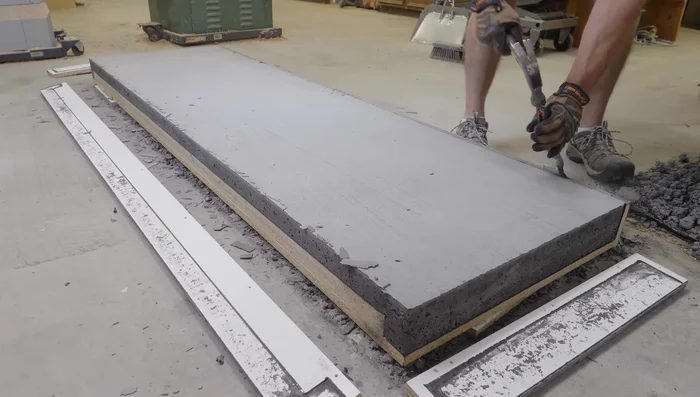 Sand and seal the concrete countertop.