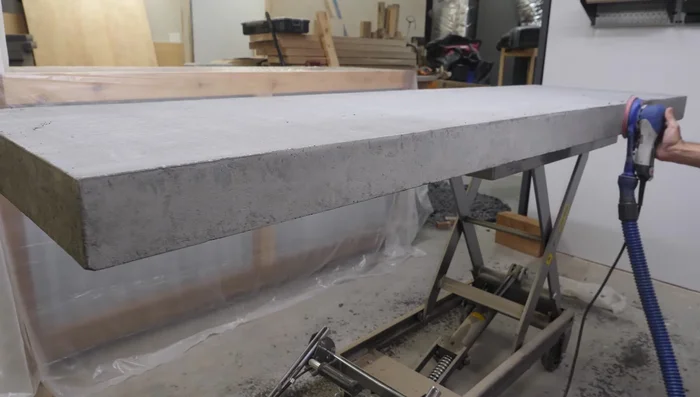 Sand and seal the concrete countertop.