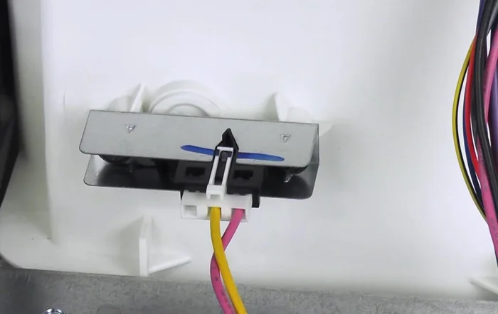 Pull the sensor out and set it aside.