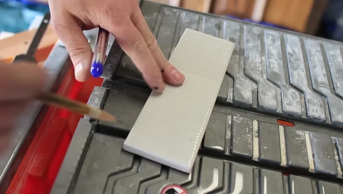Cut tiles using a wet saw or grinder (explained below).