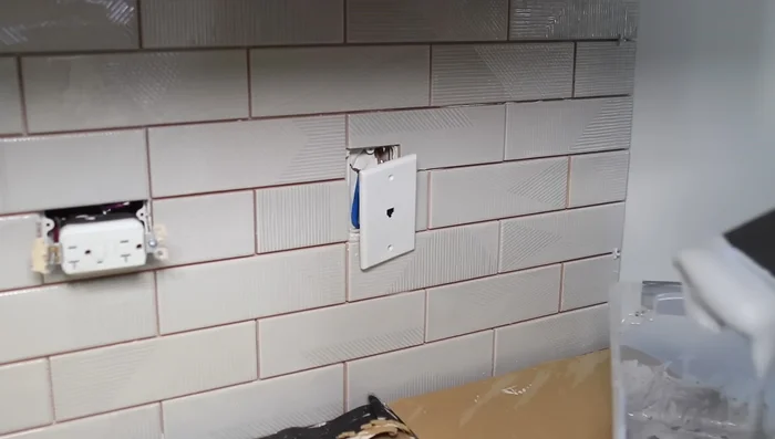 Reinstall outlets and cover plates; replace window sill (optional).