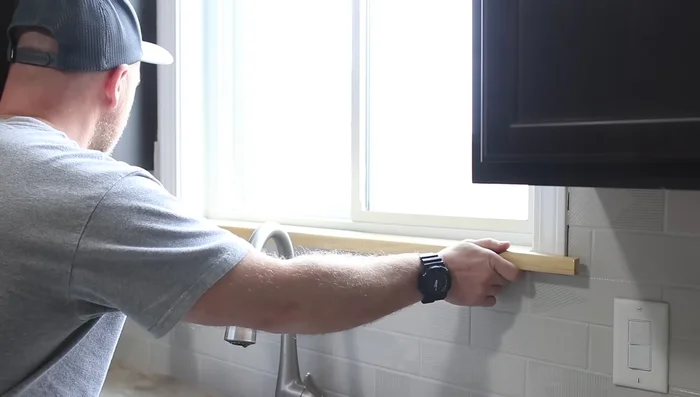 Reinstall outlets and cover plates; replace window sill (optional).