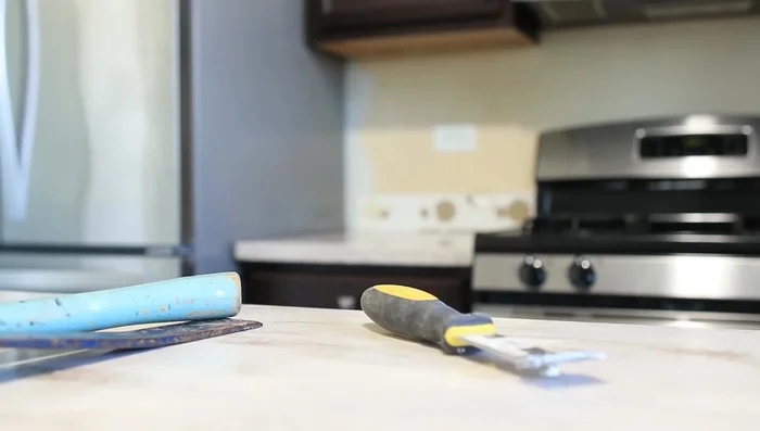 Prepare walls; remove window sill if necessary (optional).