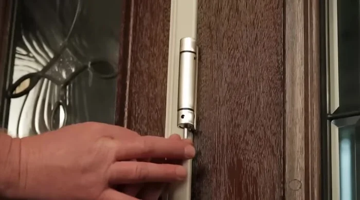 Adjust to minimum tension needed to close and latch the door. Too much tension reduces hinge lifespan.
